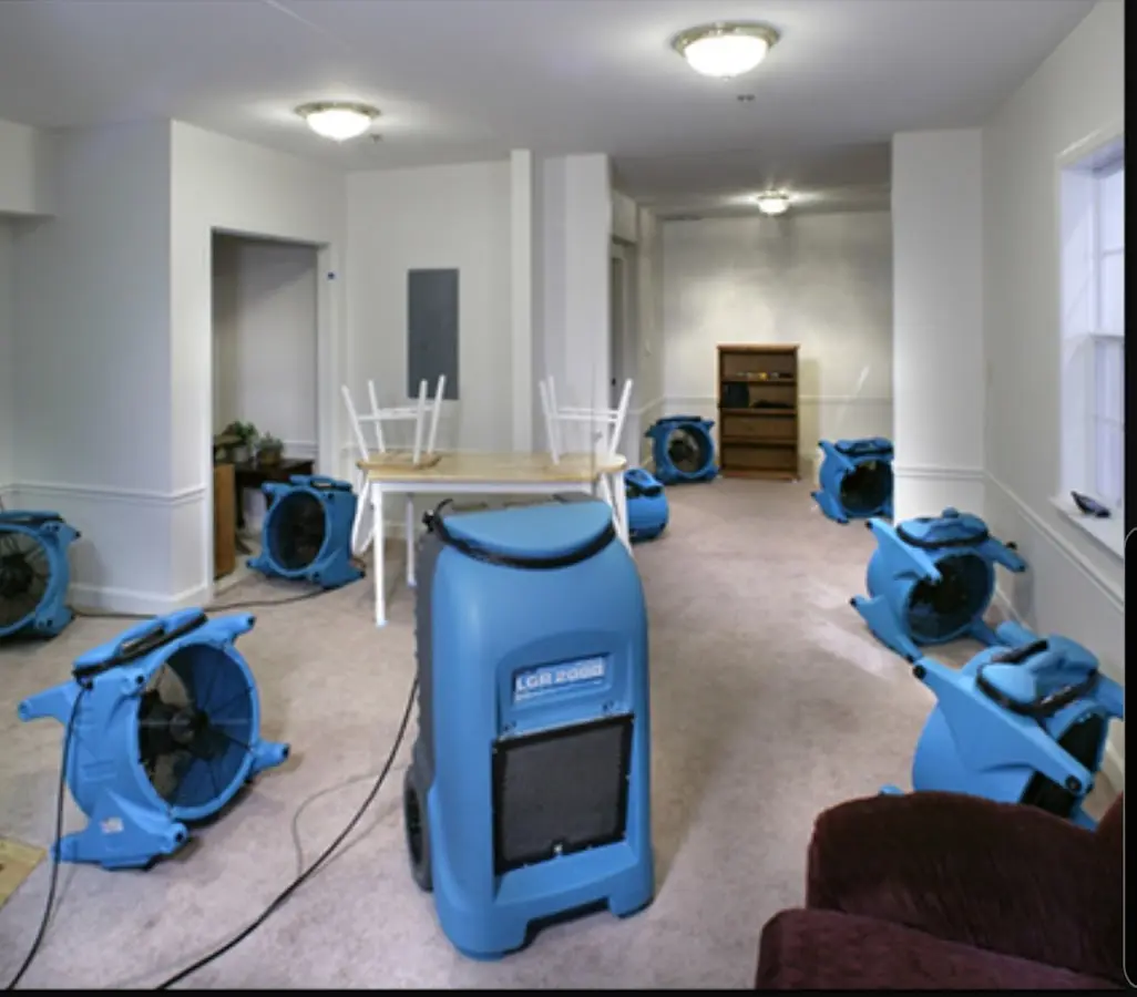 Air movers and dehumidifier setup for Water Damage Restoration in Olympia Heights